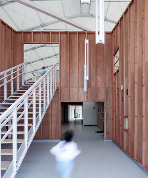 yasutaka yoshimura adapts warehouse into a kindergarten in japan