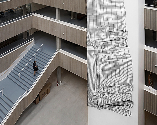 BORGMAN | LENK   adds massive steel intervention to denmark's lillebaelt academy