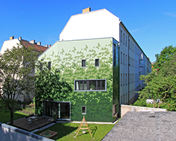 brandt + simon architekten adds green tile façade to berlin home