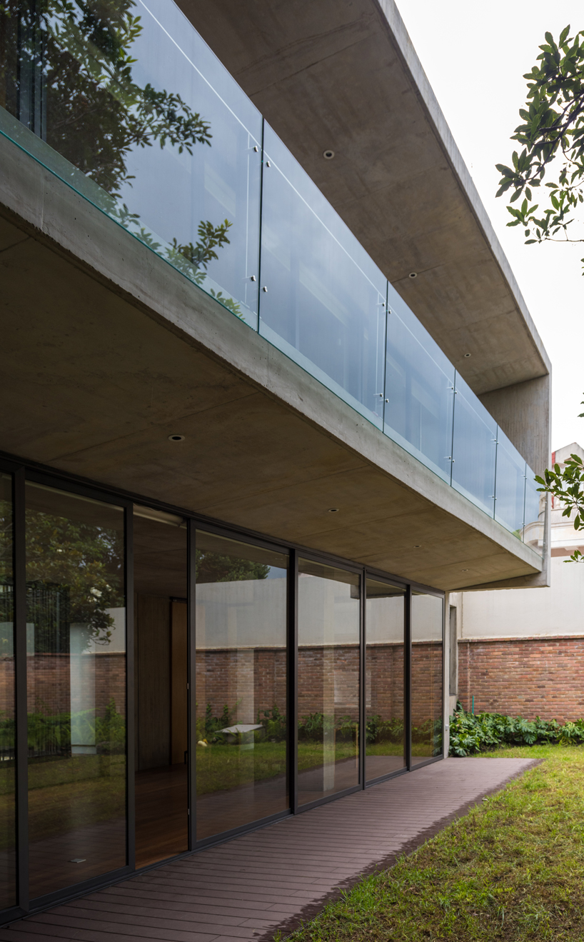 guillermo fisher adds patio to bogotá's cantilevered house