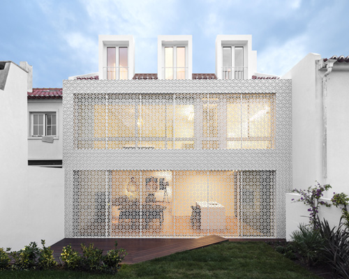 joão tiago aguiar envelops portuguese house with operable filigree screen