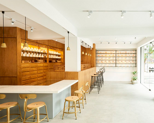 moyadesign renovates 50-year-old building in taipei into traditional medicine clinic