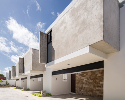 P11 arquitectos uses intersecting elements on façade of mexican housing complex