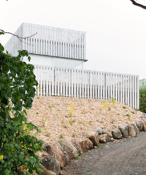 red architecture develops transportable surfers house in new zealand