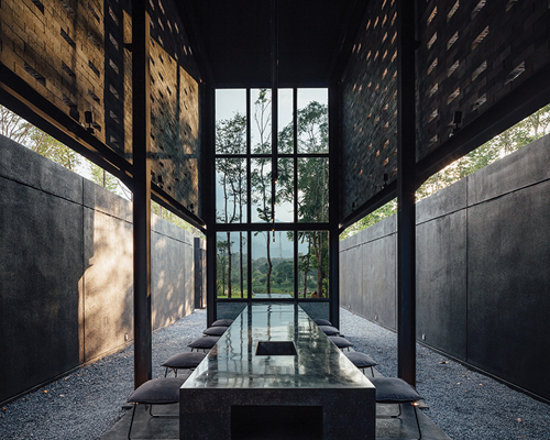 secondfloor architects construct yellow submarine coffee tank within thailand's khao yai national park