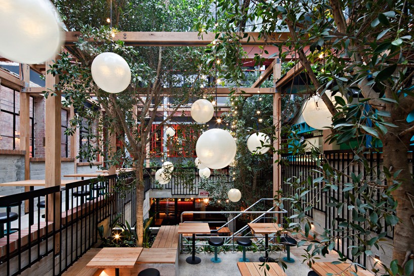 techne transforms former textile mill into garden state hotel in melbourne