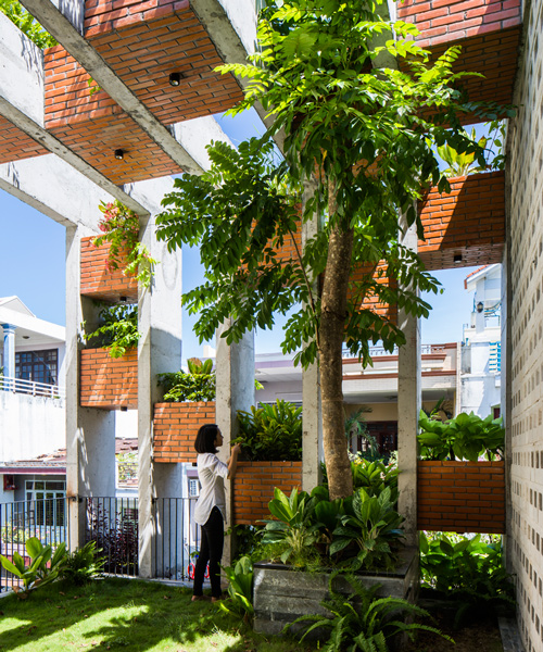 ALPES green design & build brings resort lifestyle to vietnamese townhouse