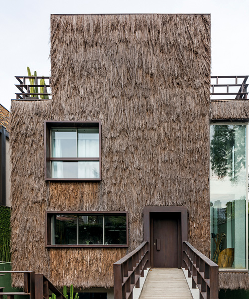 campana brothers clad family home in são paulo with natural palm fibers