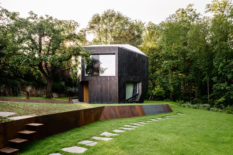 daluz gonzalez frames views of deciduous forest throughout swiss family home