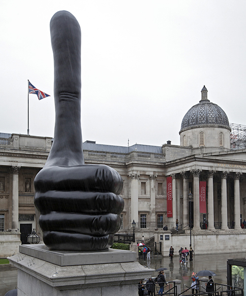 david shrigley unveils giant thumbs-up for fourth plinth in london's trafalgar square