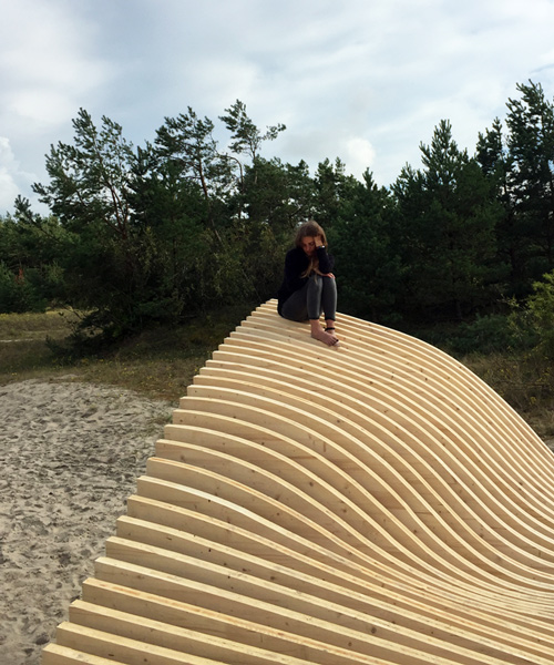 EASA students craft timber seating installation on a beach in lithuania