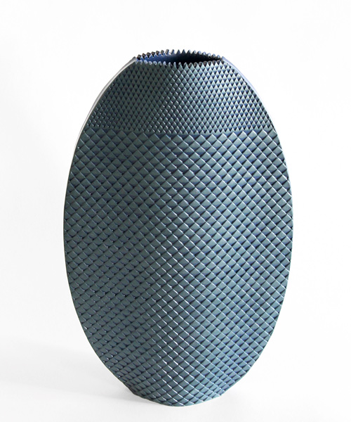 hélène morbu handcrafts ceramic vases with surfaces mimicking textiles