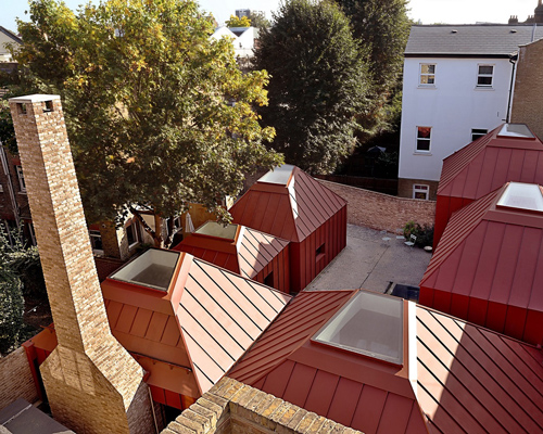 henning stummel's tin house in london is a composition of pyramidal pavilions