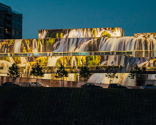 ignas lukauskas turns a soviet garage in vilnius into a luminous waterfall