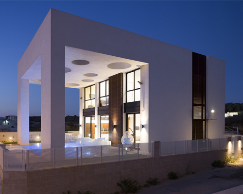 dan and hila israelevitz add round light openings to house in israel