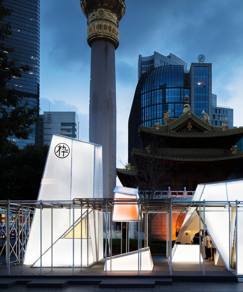 lukstudio assembles a series of luminous urban prisms on a shanghai plaza