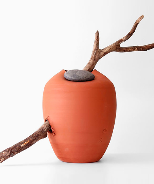 martín azúa's vases are tenderly interrupted by nature