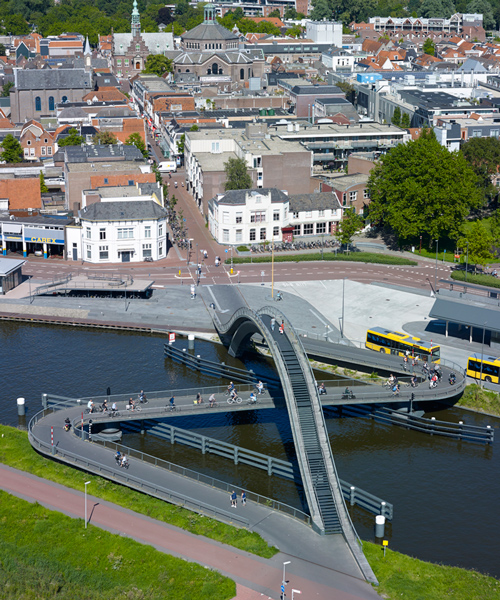 NEXT architects completes tram square next to melkwegbridge in the netherlands
