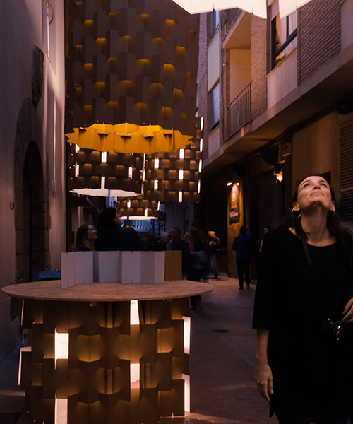 nituniyo + memosesmas craft cardboard lanterns to float above the streets of castellón