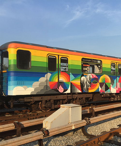 okuda san miguel colorizes an entire train in kiev with prismatic paintings