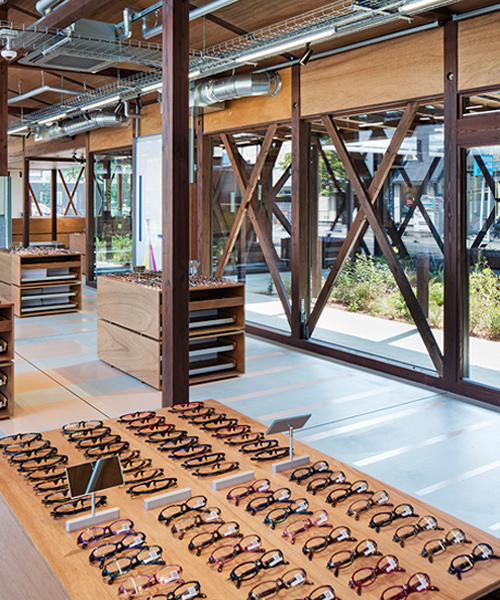 schemata architects remove façade to reveal eyewear brand's timber interior