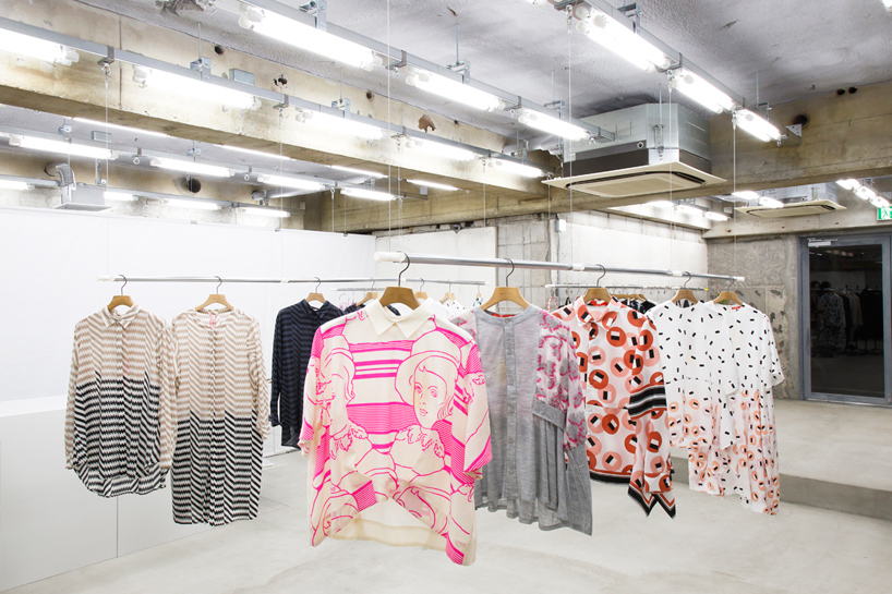 schemata architects suspend adaptable hanger system for clothing store in tokyo