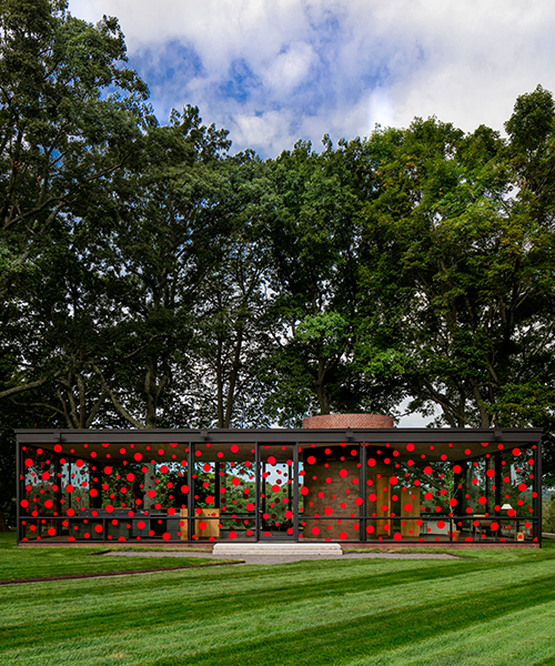 yayoi kusama dots philip johnson's glass house in a red polka pattern