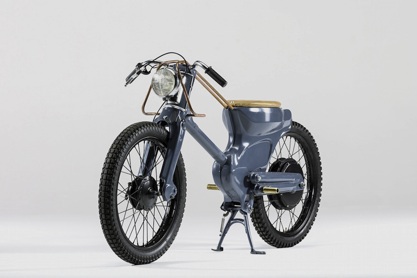 deus electric custom motorcycle is highlighted with copper