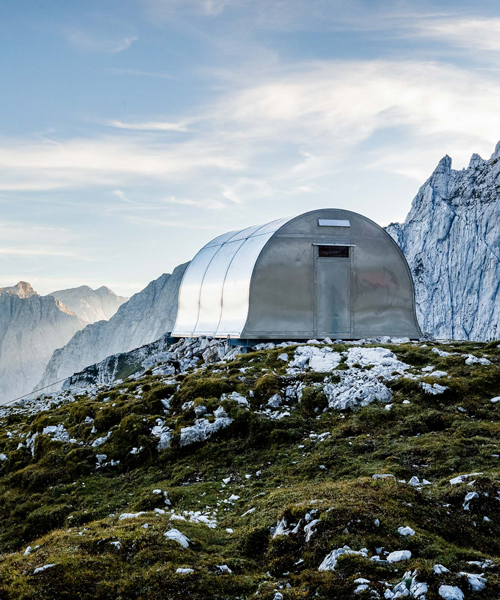 bell-shaped alpine shelter constructed amid the slovenian mountains