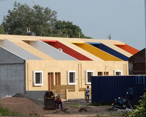 SPACE architects' affordable housing in india emphasizes simplicity through color