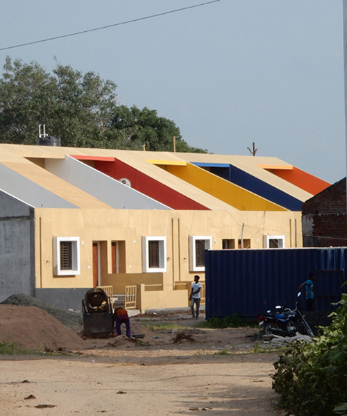 SPACE architects' affordable housing in india emphasizes simplicity through color