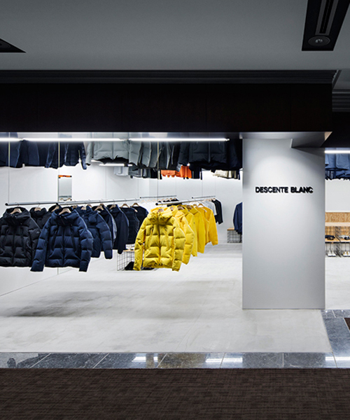 schemata architects incorporate motion into descente blanc store in tokyo