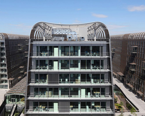 anne démians tops office buildings with an organic wood envelope