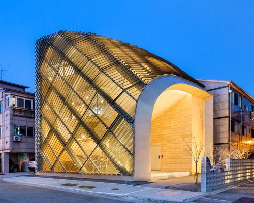 AND clads café/residence in south korea with angled aluminum louvers