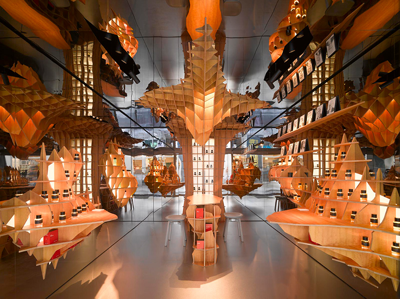 jakob + macfarlane's parisian perfume store for frédéric malle features latticed displays