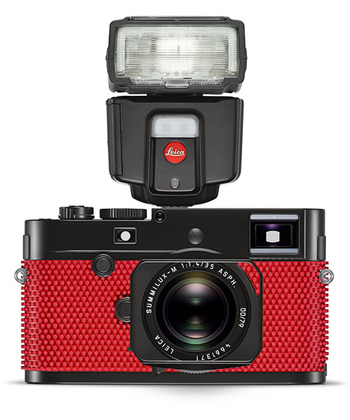 rolf sachs + leica's M-P grip camera is wrapped in ping-pong rubber