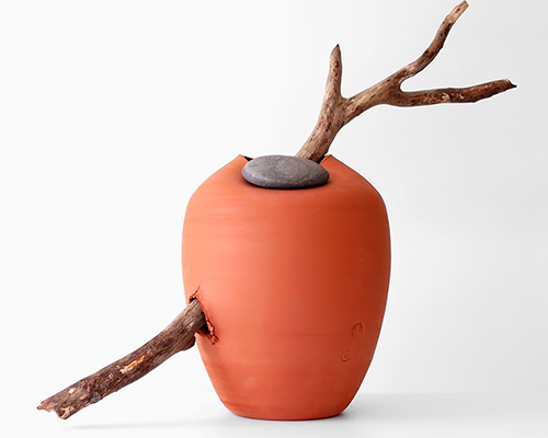 martín azúa's vases are tenderly interrupted by nature