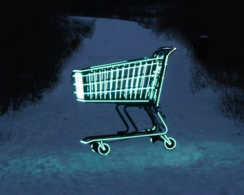 molly v. dierks evokes consumerism with neon shopping cart