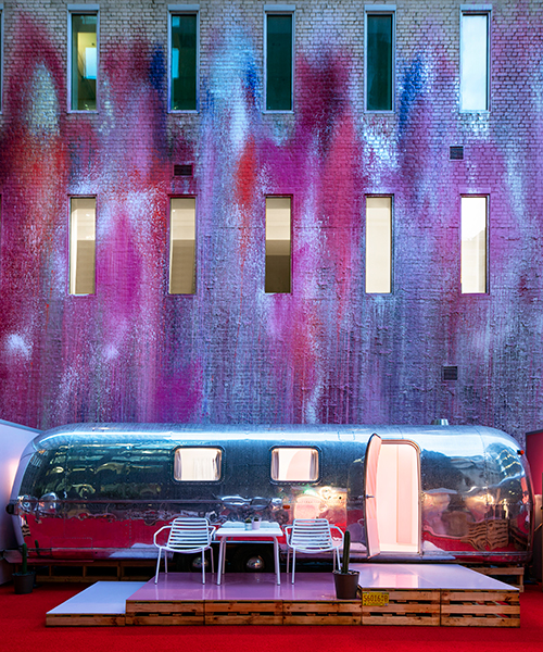 'notel' hosts guests in chrome airstream trailers on top of a melbourne parking lot