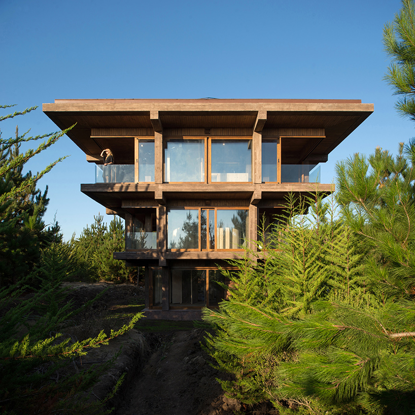 pezo von ellrichshausen's nida house in chile is stacked like an inverted ziggurat