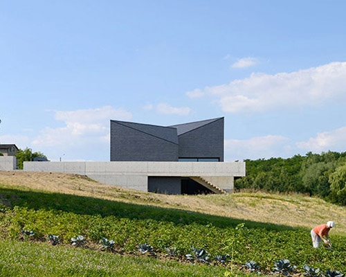 house in krostoszowice: rs+robert skitek's bold creation in silesia, poland