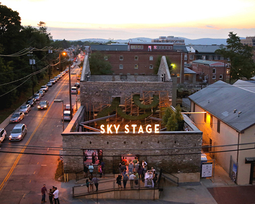 'sky stage' is a public artwork + theater built in the shell of a burned building