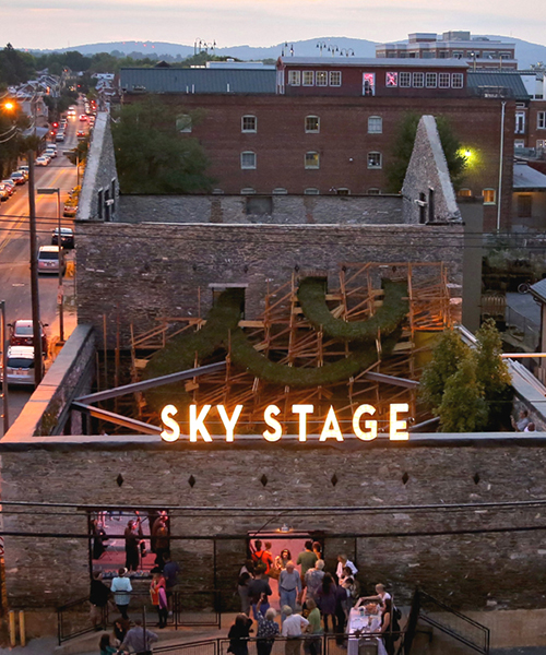 'sky stage' is a public artwork + theater built in the shell of a burned building