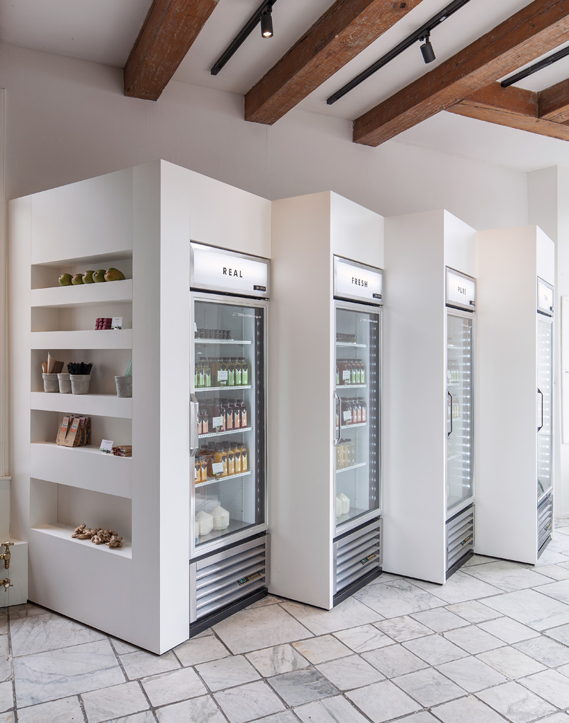 standard studio completes cold pressed juicery interior in amsterdam