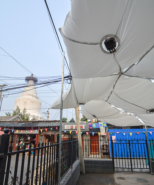 max gerthel + tectonicus' breathing 'octopus pavilion' lights up beijing's baitasi district