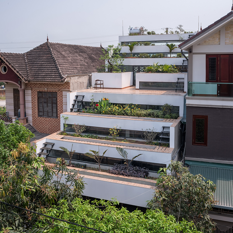 H&P architects creates tiered home in vietnam with stepped back terraces