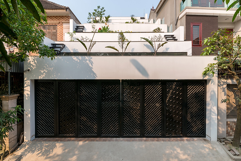 H&P architects builds tiered 'terraces home' in vietnam