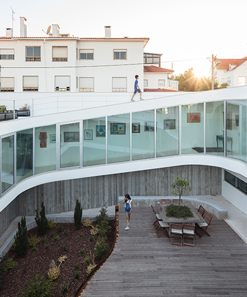 antónio costa lima loops corridor around patio in portuguese house