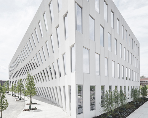 bjarke ingels group shapes philadelphia office building in response to its setting