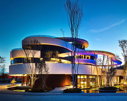 chain 10 urban space design's clubhouse in taiwan features curving ribbon façade